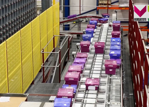Versatote tote boxes in use at a Warehousing System